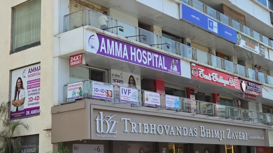 Amma Hospital signage at Fortune Square, Chala, Vapi